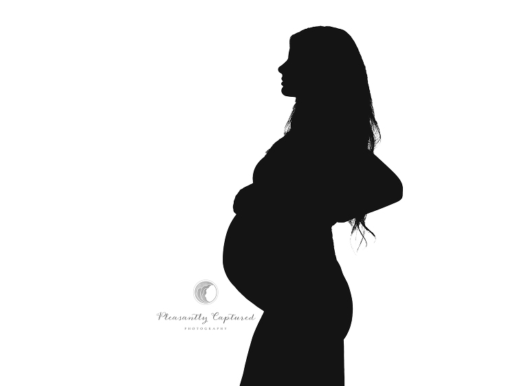 Beautiful black and white studio maternity silhouette Pregnancy Photography NC pleasantly captured