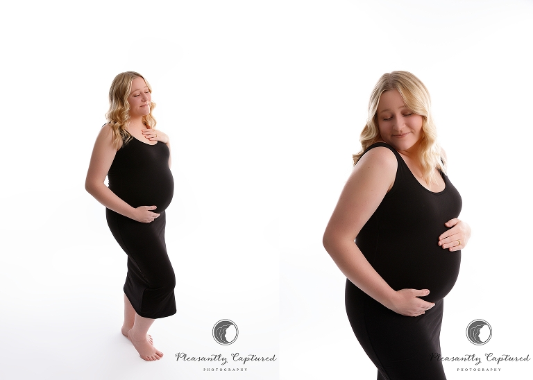 studio maternity session pregnant mother in form fitting black dress camp lejeune nc maternity