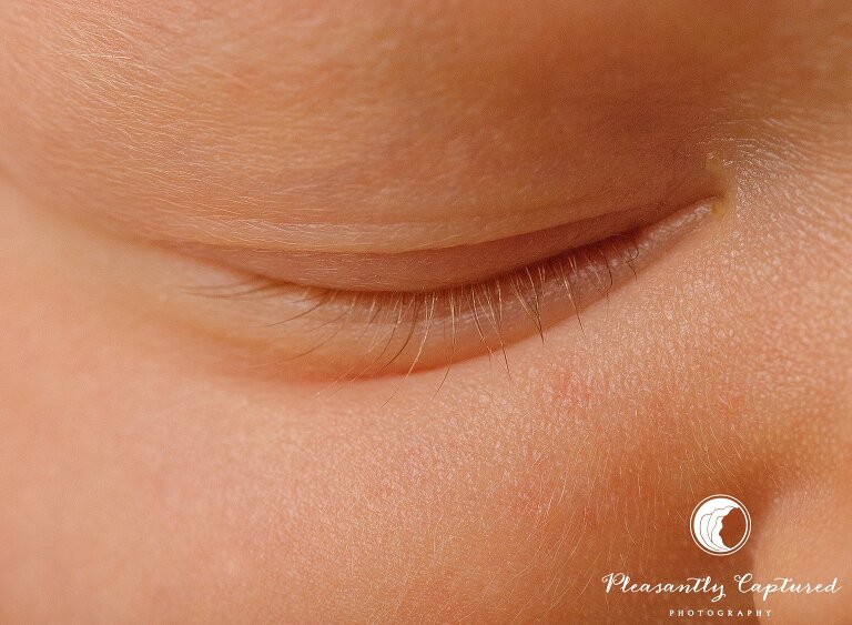 closeup of newborn baby girl eye lashes - Sneads Ferry Newborn Photography | New Family of 3