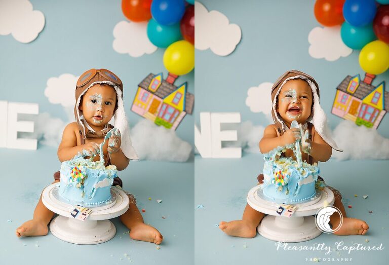boy smashing cake and frosting during Up Themed Cake Smash | Birthday Photography Jacksonville NC