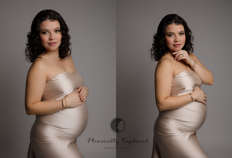 Pregnant Mother in beautiful silky and flowy taupe fabric with hands on pregnant belly Studio Maternity Richlands NC