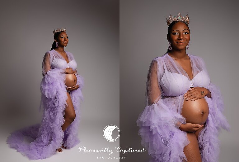 Pregnant woman in purple robe wearing a crown during studio maternity session in Jacksonville, NC